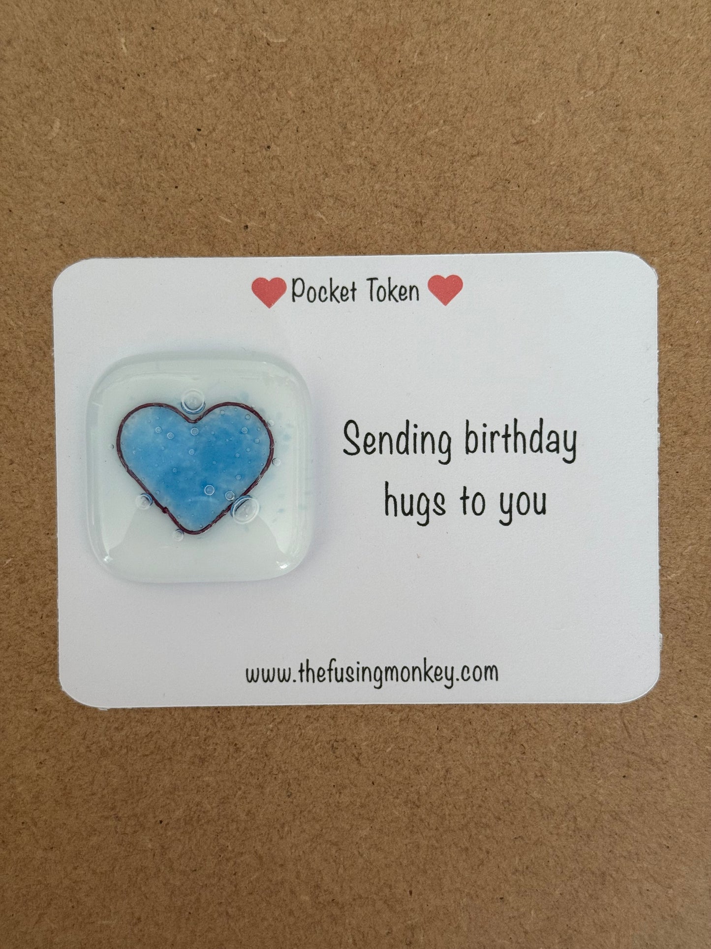 Sending birthday hugs glass heart token