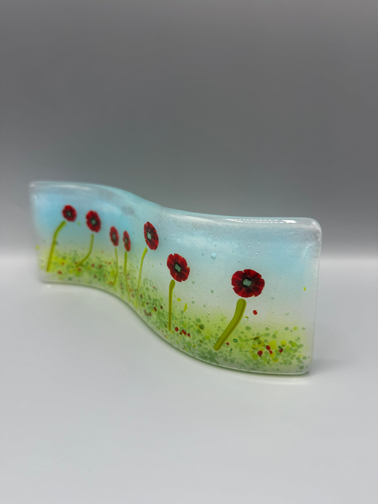 Poppies in grass meadow fused glass wave