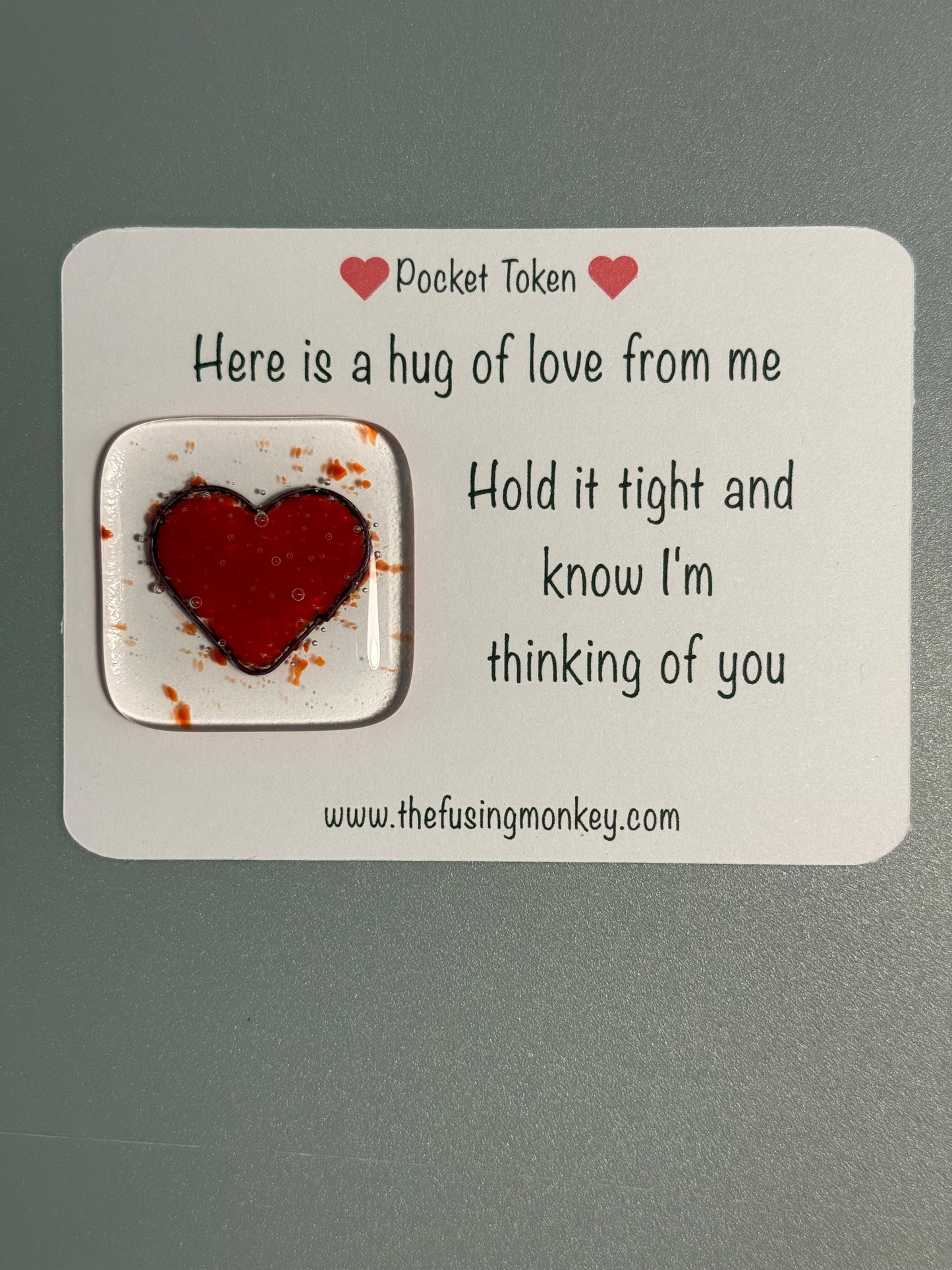 Here is a hug of love from me glass heart token