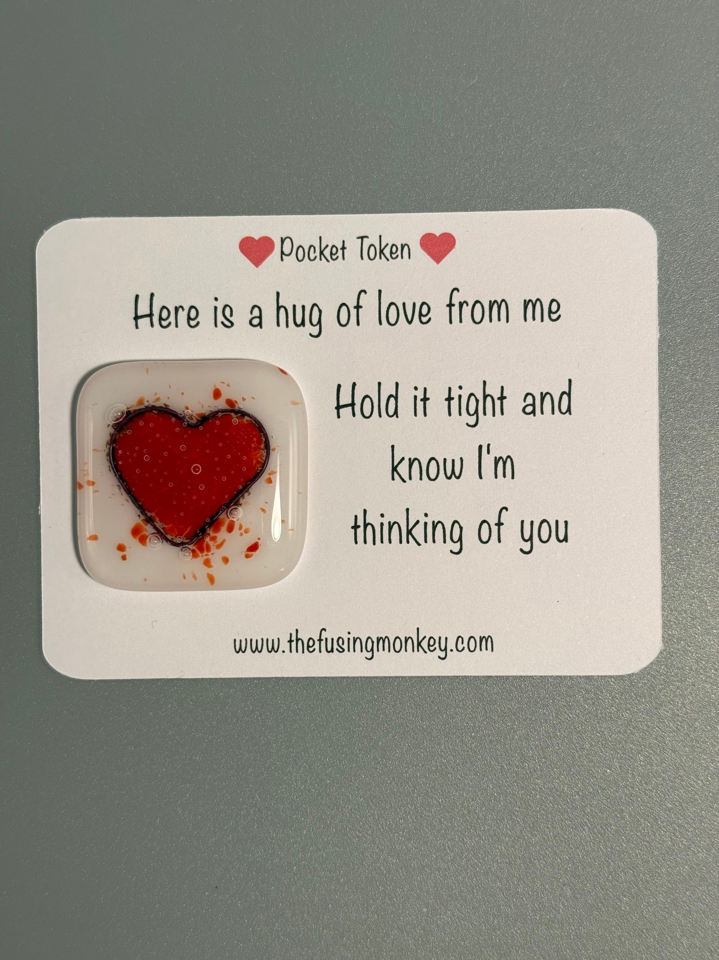 Here is a hug of love from me glass heart token