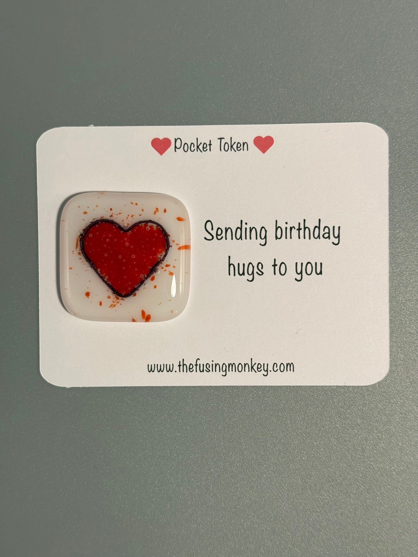 Sending birthday hugs glass heart token