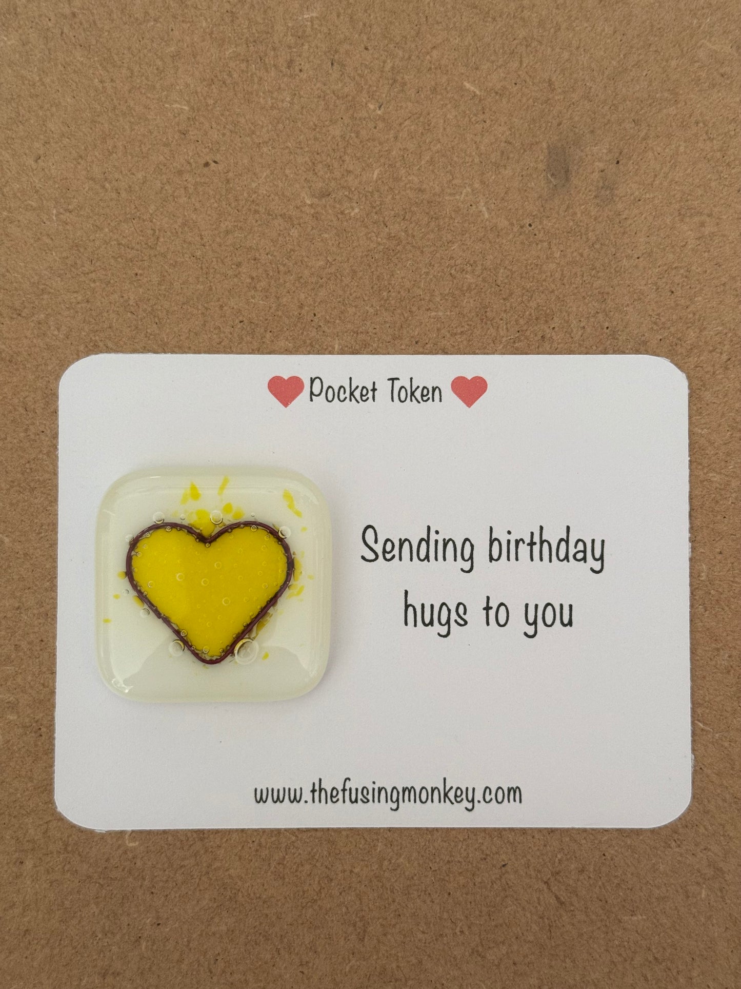 Sending birthday hugs glass heart token