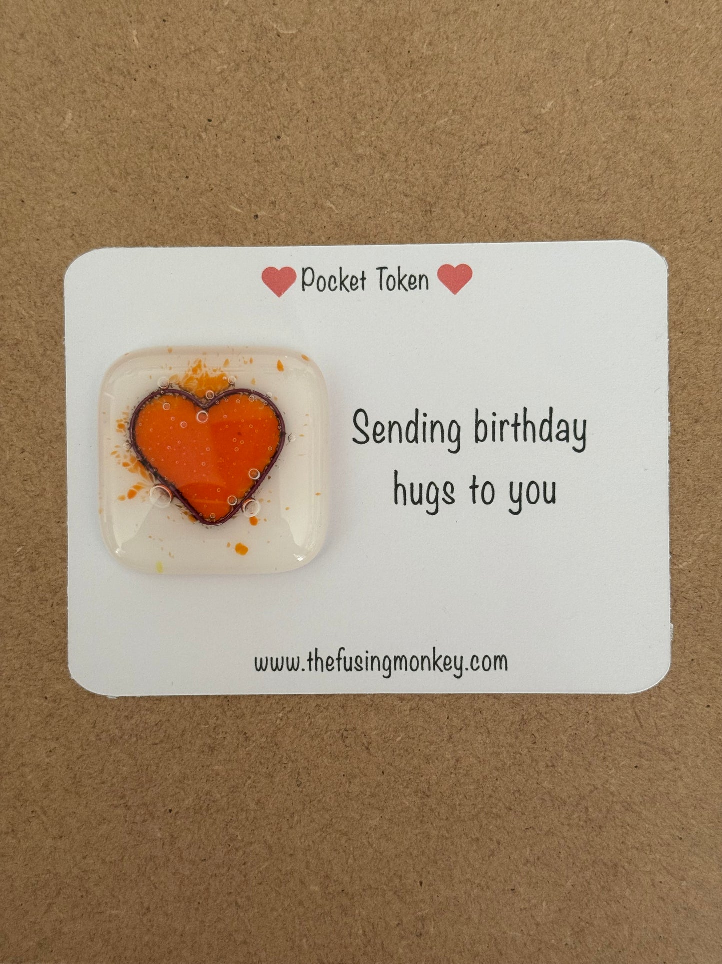 Sending birthday hugs glass heart token