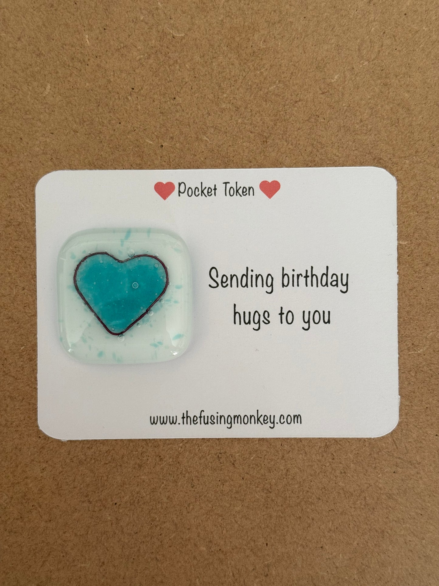 Sending birthday hugs glass heart token